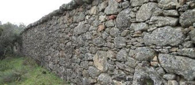 LISTA ROJA. La mitad de la cerca histórica de Felipe II de El Escorial